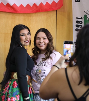 Two female students smiling