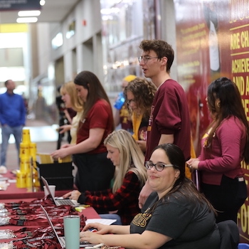 Group of staff sitting at table